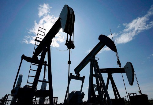 Pumpjacks pump crude oil near Halkirk, Alta., on June 20, 2007. THE CANADIAN PRESS/Larry MacDougal