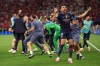 FILE - PSG's Goncalo Ramos celebrates after winning the Champions League final soccer match between Paris Saint-Germain and Arsenal in Budapest, Hungary, on May 30, 2026. AC Milan has completed the signing of Portugal forward Gonçalo Ramos from Paris Saint-Germain for a club record fee of over 70 million euros. (AP Photo/Armin Durgut)