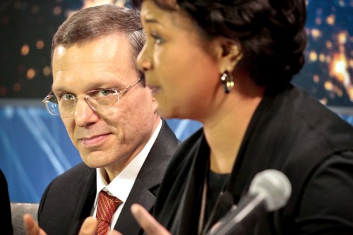FILE - Harvard physicist Avi Loeb, left, listens as former NASA astronaut Dr. Mae C. Jemison speaks during a press conference, April 12, 2016, in New York. (AP Photo/Bebeto Matthews, File)