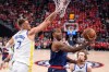FILE - LA Clippers forward Kawhi Leonard, center, shoots as Golden State Warriors center Kristaps Porzingis defends during the first half of an NBA play-in tournament basketball game Wednesday, April 15, 2026, in Inglewood, Calif. (AP Photo/Mark J. Terrill,File)