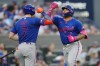 New York Mets' Francisco Alvarez (4) celebrates his solo home run against the Toronto Blue Jays with Brett Baty (7) during fifth inning MLB baseball action in Toronto on Tuesday, June 30, 2026. THE CANADIAN PRESS/Nathan Denette