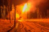 In this image made from video provided by Russian Defense Ministry Press Service on Tuesday, June 30, 2026, Russian TOS-1 Solntsepyok heavy flamethrower rocket launcher fires towards the Ukrainian positions. (Russian Defense Ministry Press Service via AP)