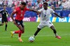 Panama's Jose Cordoba, right, challenges for the ball with England's Ollie Watkins during the World Cup Group L soccer match in East Rutherford, N.J., near New York, Saturday, June 27, 2026. (AP Photo/Frank Franklin II)