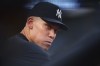 An injured New York Yankees' Aaron Judge looks on from the dugout during the third inning of a baseball game against the Detroit Tigers, Tuesday, June 30, 2026, in New York. (AP Photo/Heather Khalifa)