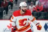 FILE - Calgary Flames center Dillon Dube (29) skates against the Detroit Red Wings in the first period of an NHL hockey game, Oct. 22, 2023, in Detroit. (AP Photo/Paul Sancya, File)