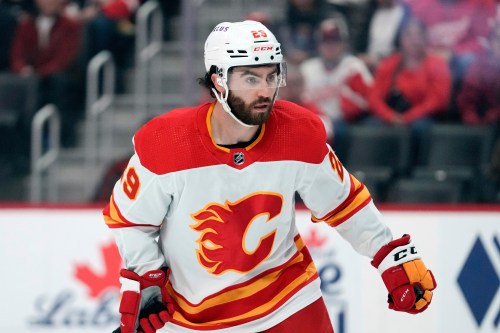 FILE - Calgary Flames center Dillon Dube (29) skates against the Detroit Red Wings in the first period of an NHL hockey game, Oct. 22, 2023, in Detroit. (AP Photo/Paul Sancya, File)