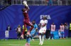 Congo goalkeeper Lionel Mpasi (1) save the ball during the World Cup round of 32 soccer match between England and Congo in Atlanta, Wednesday, July 1, 2026. (AP Photo/Butch Dill)