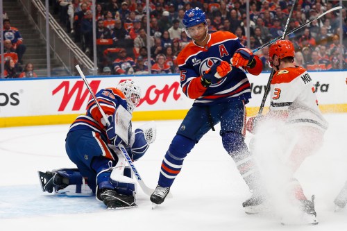 Darnell Nurse (centre) in action for the Oilers against the Anaheim Ducks in Edmonton on Wednesday, April 22, 2026. THE CANADIAN PRESS/Codie McLachlan