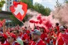 Switzerland fans march toward B.C. Place before a World Cup Group B soccer match against Canada, in Vancouver, on Wednesday, June 24, 2026. THE CANADIAN PRESS/Timothy Matwey