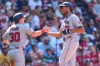 Washington Nationals' James Wood, right, is congratulated by Jacob Young after his three-run home run in the seventh inning of a baseball game against the Boston Red Sox, Wednesday, July 1, 2026, in Boston. (AP Photo/Charles Krupa)
