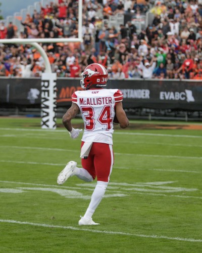 Calgary Stampeders' Tyreik McAllister (34) runs for a punt return touchdown against the B.C. Lions during second half CFL football action in Kelowna, B.C., on Saturday, June 27, 2026. THE CANADIAN PRESS/Steve Dunsmoor