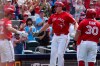 Toronto Blue Jays' Ernie Clement, left, and Alejandro Kirk congratulates Sean Keys after he hit a three run home run against the New York Mets during third inning MLB baseball action in Toronto on Wednesday, July 1, 2026. THE CANADIAN PRESS/Frank Gunn