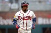 Atlanta Braves second baseman Ozzie Albies (1) scores a home run during the third inning of a baseball game against the St. Louis Cardinals Wednesday, July 1, 2026, in Atlanta. (AP Photo/Erik Rank)