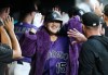 Colorado Rockies' Hunter Goodman celebrates in the dugout after hitting a two-run home run in the fifth inning of a baseball game against the Miami Marlins Wednesday, July 1, 2026, in Denver. (AP Photo/Geneva Heffernan)