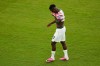 United States' Folarin Balogun (20) walks off the field after receiving a red card during the World Cup round of 32 soccer match between the United States and Bosnia in Santa Clara, Calif., near San Francisco, Wednesday, July 1, 2026. (AP Photo/Jeff Chiu)
