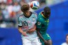 Belgium's Charles De Ketelaere (17) and Senegal's Pape Gueye (26) jumps for the ball during the World Cup round of 32 soccer match between Belgium and Senegal in Seattle, Wednesday, July 1, 2026. (AP Photo/Lindsey Wasson)
