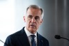 Prime Minister Mark Carney speaks to Philippine President Ferdinand Marcos Jr., not seen, during an announcement in Vancouver, on Thursday, July 2, 2026. THE CANADIAN PRESS/Ethan Cairns