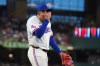 Texas Rangers starting pitcher Nathan Eovaldi comes off the field after the fifth inning of a baseball game against the Detroit Tigers, Thursday, July 2, 2026, in Arlington, Texas. (AP Photo/LM Otero)