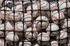 MLB baseballs are seen before a baseball game between the Atlanta Braves and the St. Louis Cardinals, Tuesday, June 30, 2026, in Atlanta. (AP Photo/Mike Stewart)