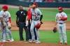 St. Louis Cardinals pitcher Dustin May (3) reacts with manager Oliver Marmol, left, and a trainer, center, after an injury in the first inning of a baseball game against the Atlanta Braves, Thursday, July 2, 2026, in Atlanta. (AP Photo/Colin Hubbard)