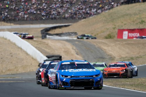Kyle Larson, foreground, drives in front of cars during a NASCAR Cup Series auto race at Sonoma Raceway, Sunday, June 28, 2026, in Sonoma, Calif. (AP Photo/Jeff Chiu)