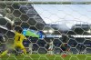 Cape Verde goalkeeper Vozinha (1) is scored on by Argentina's Lisandro Martinez during the World Cup round of 32 soccer match between Argentina and Cape Verde in Miami Gardens, Fla., Friday, July 3, 2026. (AP Photo/Lynne Sladky)