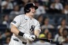 New York Yankees' Ben Rice watches his two-run home run during the third inning of a baseball game against the Minnesota Twins, Friday, July 3, 2026, in New York. (AP Photo/Adam Hunger)