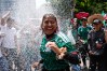 Soccer fans get revved up at a watch party for the World Cup match between Mexico and Ecuador on Reforma Ave. near the Angel of Independence monument in Mexico City, Tuesday, June 30, 2026. (AP Photo/Marco Ugarte)