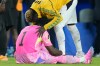 Ghana goalkeeper Lawrence Ati-Zigi (1) is comforted by teammate Kojo Peprah Oppong (21) after the World Cup round of 32 soccer match between Colombia and Ghana in Kansas City, Mo., Friday, July 3, 2026. (AP Photo/John Locher)