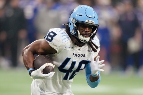 Toronto Argonauts' Wynton McManis (48) runs the ball during second half CFL football action at the 111th Grey Cup against the Winnipeg Blue Bombers, in Vancouver, B.C., Sunday, Nov. 17, 2024. THE CANADIAN PRESS/Frank Gunn