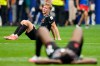 Canada's Luc de Fougerolles (4) sits on the turf following the team's loss to Morocco in FIFA World Cup round of 16 soccer action, in Houston, Saturday, July 4, 2026. THE CANADIAN PRESS/Frank Gunn