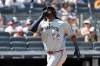 Minnesota Twins designated hitter Josh Bell reacts after hitting a solo home run during the seventh inning of a baseball game against the New York Yankees, Saturday, July 4, 2026, in New York. (AP Photo/Adam Hunger)