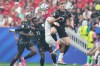 Canada's Alistair Johnston, top, and Morocco's Azzedine Ounahi vie for the ball during the World Cup round of 16 soccer match between Canada and Morocco in Houston, Saturday, July 4, 2026. (AP Photo/Eric Gay)