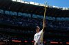 Seattle Mariners starting pitcher Logan Gilbert lifts the trident to celebrate a win over the Toronto Blue Jays in a baseball game, Saturday, July 4, 2026, in Seattle. (AP Photo/Lindsey Wasson)