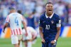 France's Kylian Mbappe (10) celebrates his team victory at the end of the World Cup round of 16 soccer match between Paraguay and France in Philadelphia, Saturday, July 4, 2026. (AP Photo/Martin Meissner)