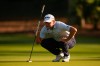 Lucas Glover lines up his putt on the second green during the first round at the RBC Heritage golf tournament, Thursday, April 16, 2026, in Hilton Head Island, S.C. (AP Photo/Mike Stewart)