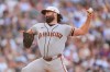 San Francisco Giants starting pitcher Robbie Ray works against the Colorado Rockies in the first inning of a baseball game Saturday, July 4, 2026, in Denver. (AP Photo/David Zalubowski)