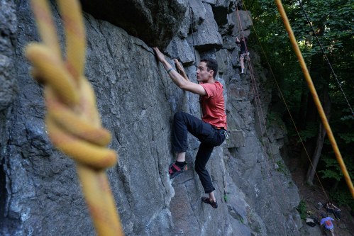 A man climbs on a cliff during the Stoned Climbers festival near Denyshi, Zhytomyr region, Ukraine, Saturday, June 27, 2026. (AP Photo/Evgeniy Maloletka)