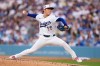 Los Angeles Dodgers starting pitcher Yoshinobu Yamamoto throws to the plate during the second inning of a baseball game against the San Diego Padres, Saturday, July 4, 2026, in Los Angeles. (AP Photo/Mark J. Terrill)