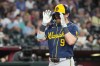 Milwaukee Brewers' Jake Bauers reacts after hitting a two-run home run against the Arizona Diamondbacks in the seventh inning of a baseball game, Sunday, July 5, 2026, in Phoenix. (AP Photo/Rick Scuteri)