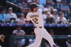 Colorado Rockies' Kyle Karros follows the flight of his three-run home run off San Francisco Giants relief pitcher Dylan Smith in the eighth inning of a baseball game Sunday, July 5, 2026, in Denver. (AP Photo/David Zalubowski)