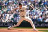 Seattle Mariners starting pitcher Emerson Hancock throws against the Toronto Blue Jays during the first inning of a baseball game, Sunday, July 5, 2026, in Seattle. (AP Photo/Lindsey Wasson)