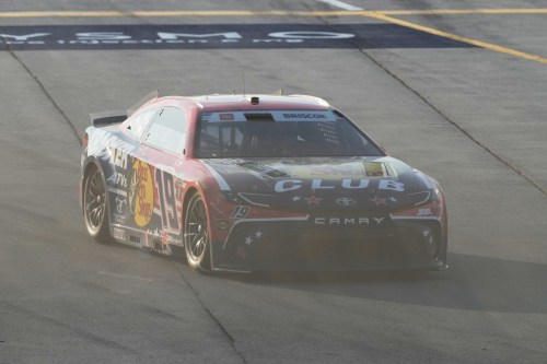 Chase Briscoe (19) drives to the track after making a pit stop during a NASCAR Cup Series auto race at Chicagoland Speedway in Joliet, Ill., Sunday, July 5, 2026. (AP Photo/Nam Y. Huh)