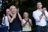 Far-right party National Rally president Jordan Bardella and far-right leader Marine Le Pen applaud during a rally in Lievin, northern France, Saturday, July 4, 2026. (AP Photo/Jean-Francois Badias)