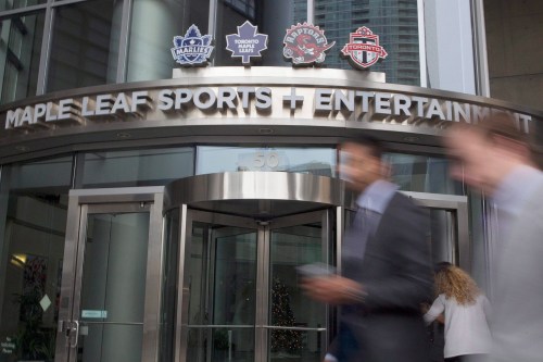 Pedestrian pass the Maple Leafs Sports and Entertainment headquarters in Toronto on Friday Dec. 9, 2011. THE CANADIAN PRESS/Chris Young