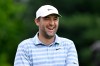Scottie Scheffler smiles as he is introduced at the first hits hole during the second round of the Travelers Championship golf tournament at TPC River Highlands, Friday, June 26, 2026, in Cromwell, Conn. (AP Photo/Jessica Hill)