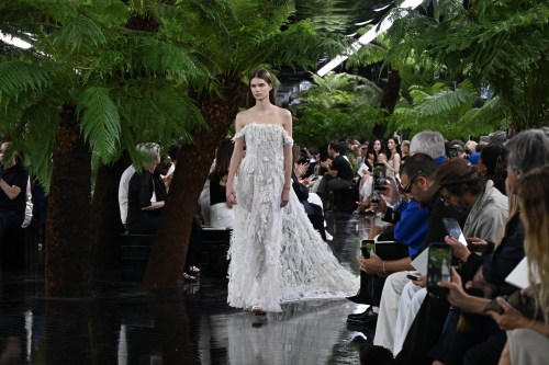 A model wears a creation as part of the Christian Dior Haute Couture Fall/Winter 2026-2027 Women's collection presented in Paris, Monday, July 6, 2026. (AP Photo/Emma Da Silva)