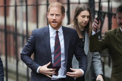 FILE - Britain's Prince Harry arrives at London's High Court to lead a group, including Elton John and Elizabeth Hurley, accusing the Daily Mail's publisher of privacy invasion through unlawful tactics in a trial that is part of a wider phone hacking scandal in London, on Jan. 21, 2026. (AP Photo/Kirsty Wigglesworth, File)