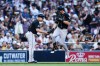 Arizona Diamondbacks' Max Kepler, right, is congratulated by third base coach J.R. House, left, after hitting a three-run home run against the San Diego Padres in the third inning of a baseball game Monday, July 6, 2026, in San Diego. (AP Photo/Derrick Tuskan)