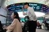 Currency traders watch monitors at the foreign exchange dealing room of the Hana Bank headquarters in Seoul, South Korea, Tuesday, July 7, 2026. (AP Photo/Ahn Young-joon)